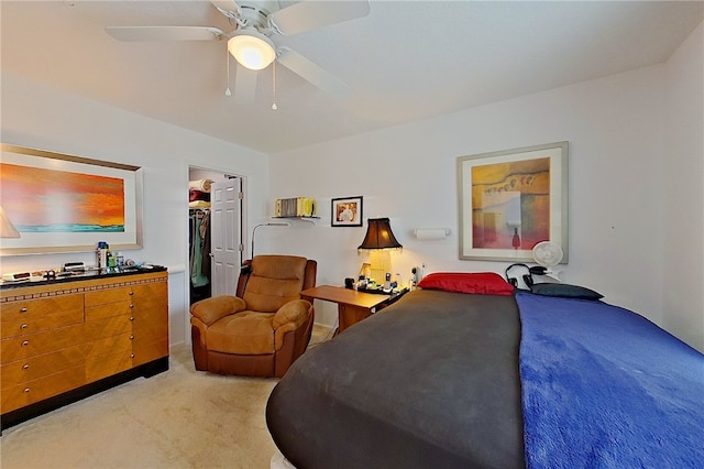 4718 Otter Creek Cir, Blackshear, GA 31516 - bedroom featuring light carpet, a spacious closet, a closet, and a ceiling fan