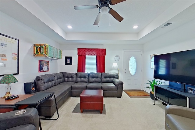 4718 Otter Creek Cir, Blackshear, GA 31516 - carpeted living room featuring plenty of natural light, ceiling fan, a tray ceiling, and recessed lighting