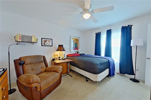 4718 Otter Creek Cir, Blackshear, GA 31516 - bedroom with light colored carpet and a ceiling fan