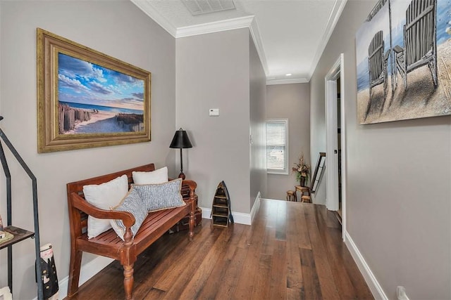 hall featuring dark hardwood / wood-style floors and ornamental molding