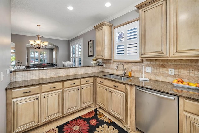 kitchen featuring dishwasher, sink, decorative backsplash, ornamental molding, and a notable chandelier