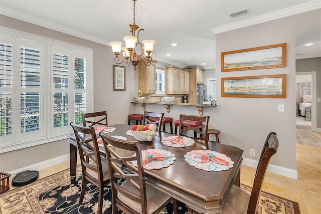 tiled dining space featuring a chandelier and crown molding