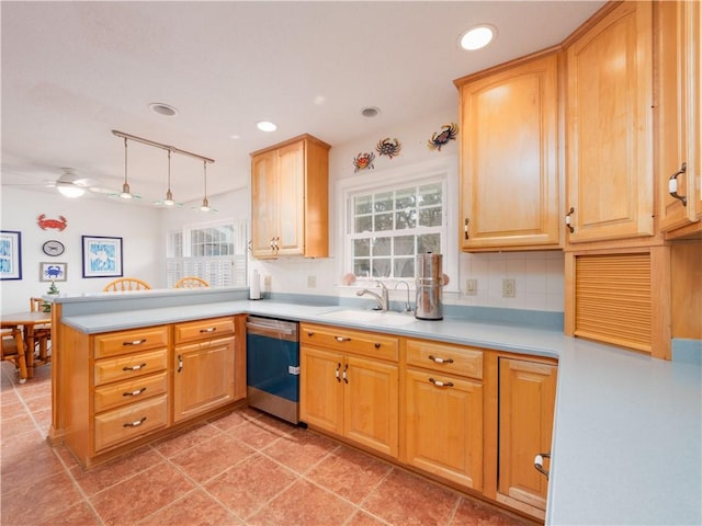 kitchen with decorative backsplash, kitchen peninsula, rail lighting, ceiling fan, and dishwasher