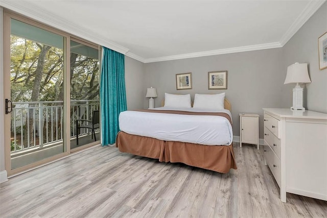 bedroom with baseboards, ornamental molding, wood finished floors, and access to exterior