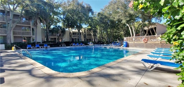 pool with a patio area