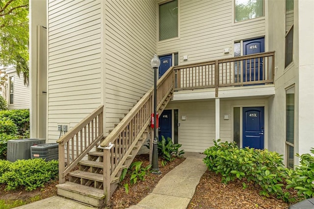 view of exterior entry featuring cooling unit