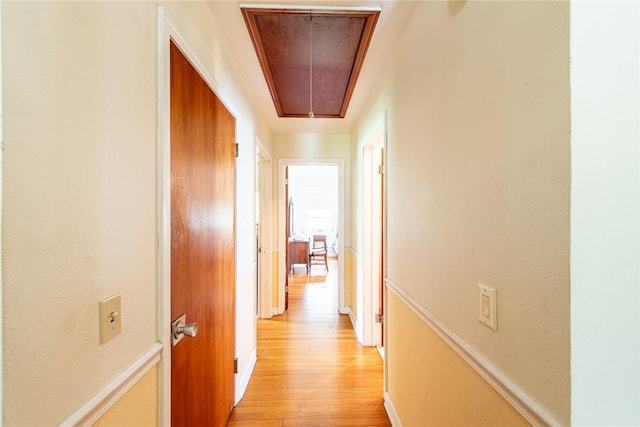 177 Pinewood St, Folkston, GA 31537 - corridor with attic access and light wood-style flooring