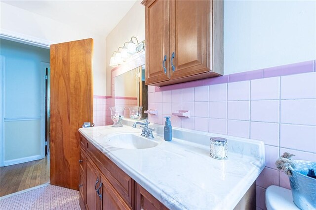 177 Pinewood St, Folkston, GA 31537 - bathroom with vanity and tile walls