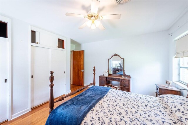 177 Pinewood St, Folkston, GA 31537 - bedroom featuring light wood finished floors, a closet, and a ceiling fan