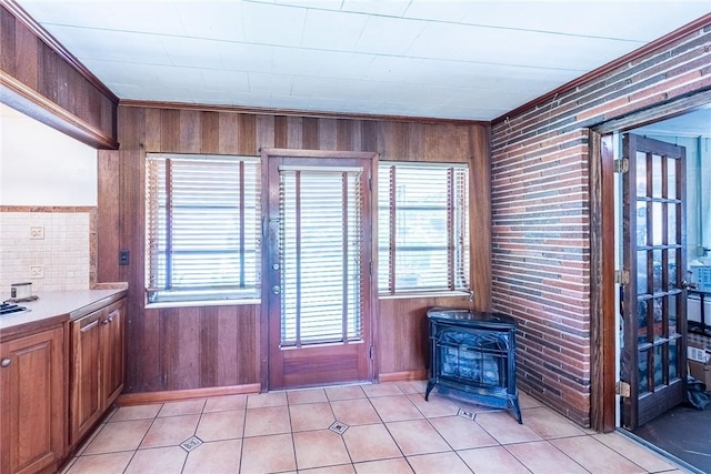177 Pinewood St, Folkston, GA 31537 - unfurnished sunroom featuring a wood stove