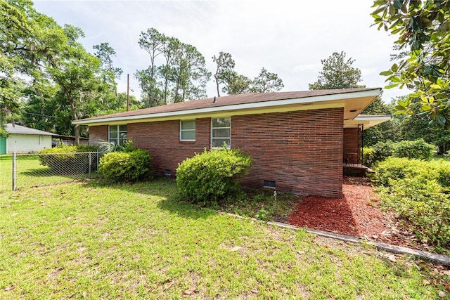 177 Pinewood St, Folkston, GA 31537 - view of home's exterior featuring crawl space and brick siding