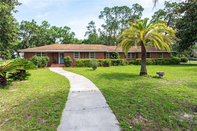 177 Pinewood St, Folkston, GA 31537 - single story home featuring a front lawn and brick siding