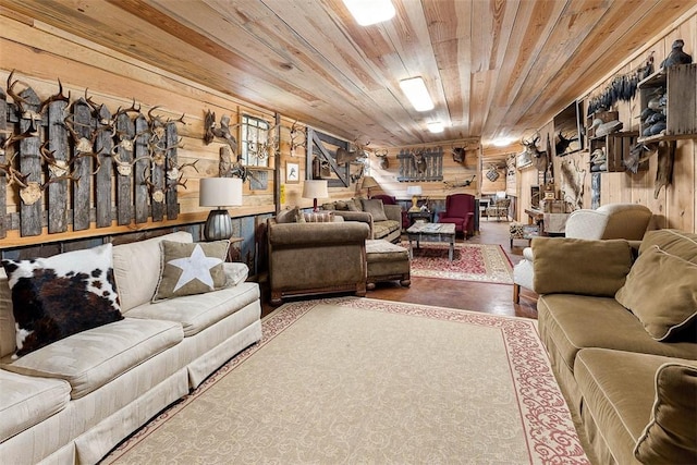 living room featuring wood ceiling and wood walls