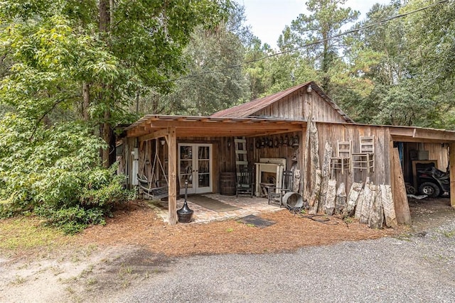 view of outdoor structure with french doors