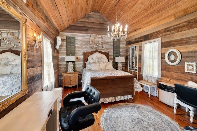 bedroom with wood walls, wood ceiling, vaulted ceiling, and a notable chandelier