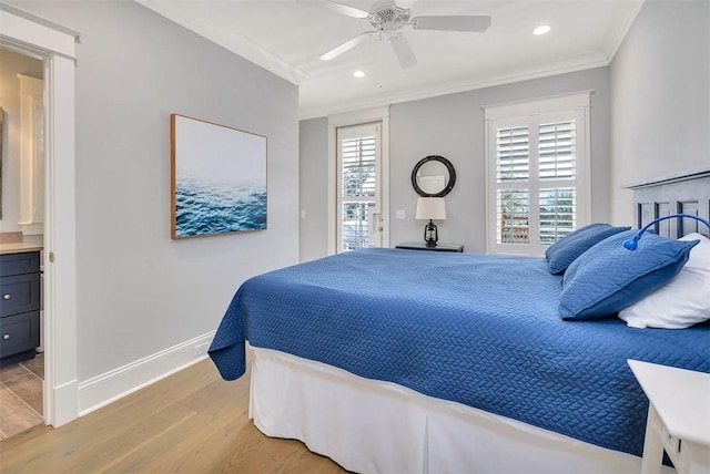 bedroom with connected bathroom, light hardwood / wood-style floors, ceiling fan, and crown molding