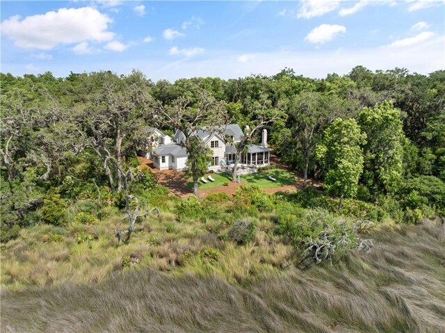 49 Hatton Ln, Saint Simons Island, GA 31522 - aerial view of property and surrounding area featuring a forest