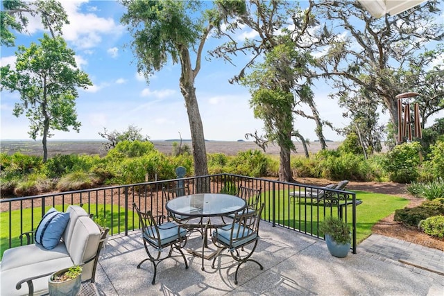 49 Hatton Ln, Saint Simons Island, GA 31522 - view of patio / terrace with outdoor dining space