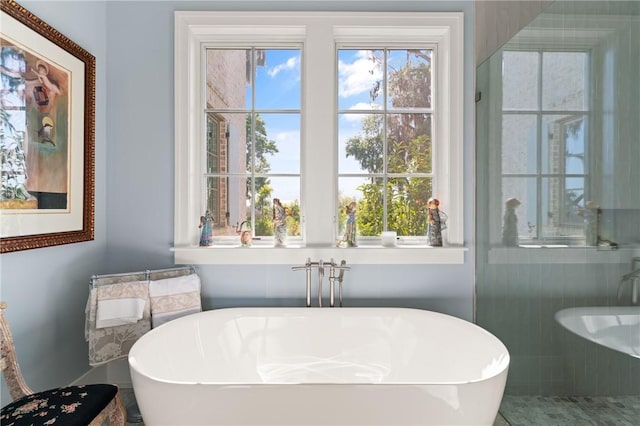 49 Hatton Ln, Saint Simons Island, GA 31522 - full bath featuring a freestanding tub