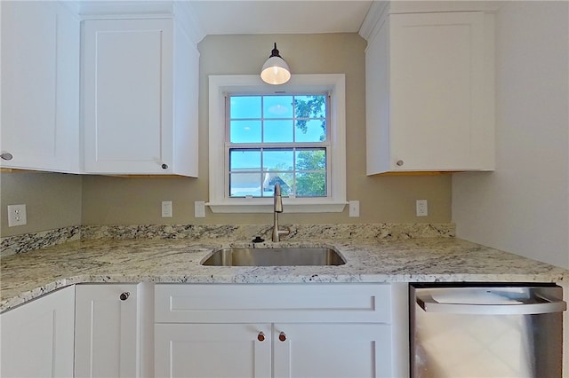 kitchen featuring a sink, white cabinets, stainless steel dishwasher, and light stone countertops
