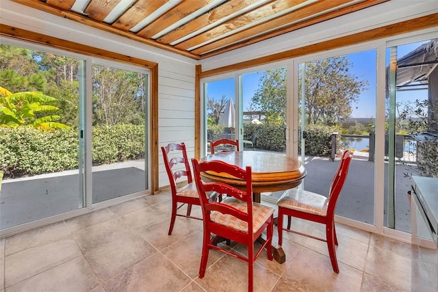 sunroom / solarium featuring a wealth of natural light