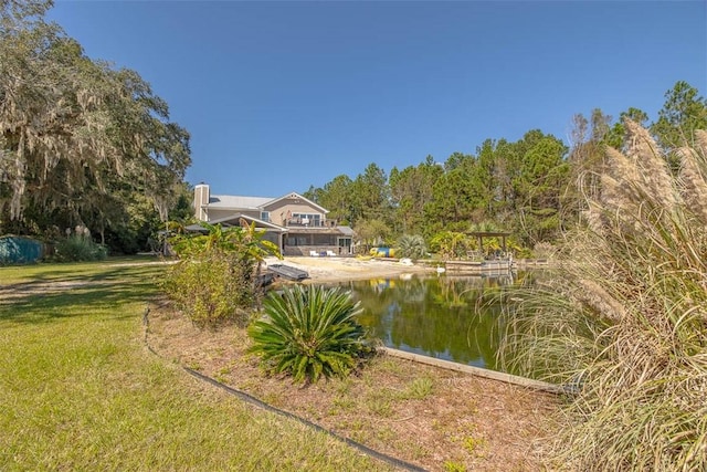 view of yard with a water view