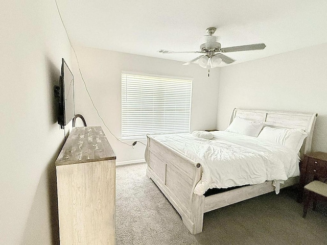 272 NE Whippoorwill Way, Ludowici, GA 31316 - bedroom with baseboards, a ceiling fan, visible vents, and light carpet