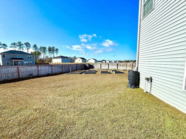 272 NE Whippoorwill Way, Ludowici, GA 31316 - view of yard with a fenced backyard and a residential view