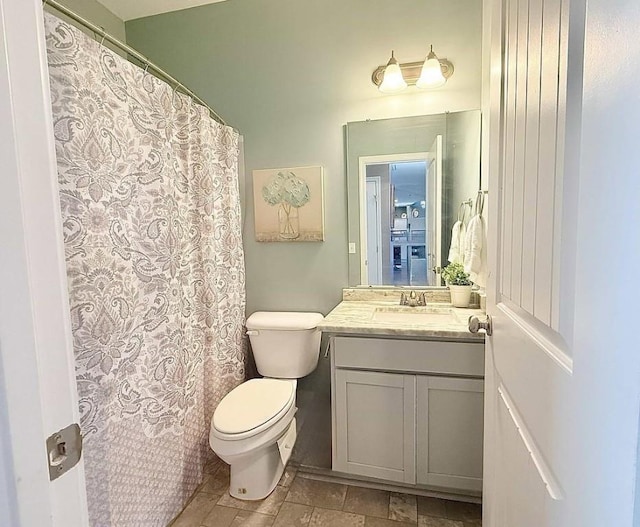 272 NE Whippoorwill Way, Ludowici, GA 31316 - bathroom with vanity, toilet, and a shower with curtain