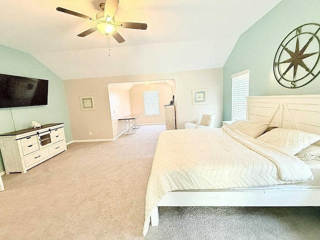 272 NE Whippoorwill Way, Ludowici, GA 31316 - bedroom with baseboards, ceiling fan, carpet, and vaulted ceiling