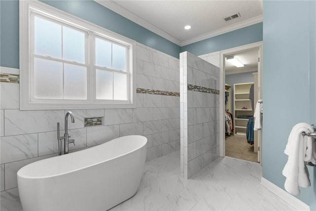 bathroom featuring ornamental molding, shower with separate bathtub, and a textured ceiling