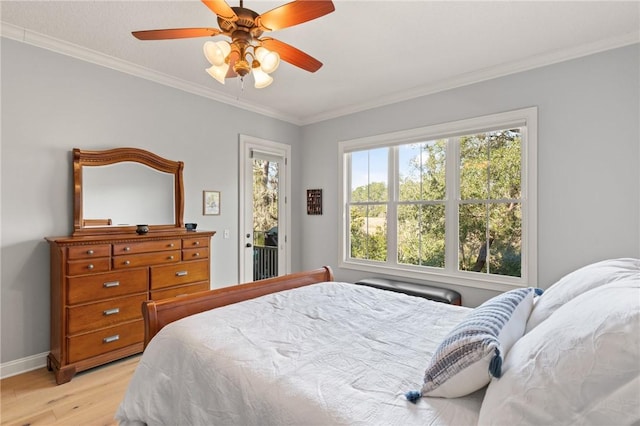 bedroom with ceiling fan, ornamental molding, light hardwood / wood-style floors, and access to outside