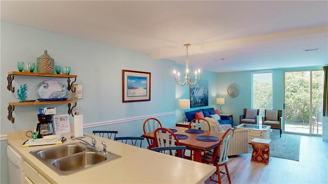 1175 N Beachview Dr Unit 389, Jekyll Island, GA 31527 - dining room with visible vents, an inviting chandelier, and light wood finished floors