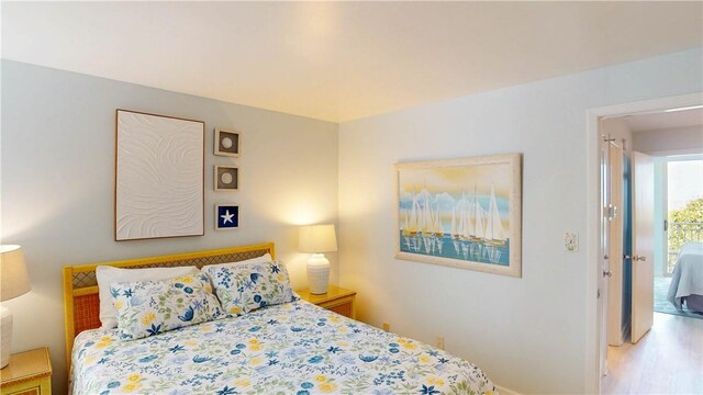 1175 N Beachview Dr Unit 389, Jekyll Island, GA 31527 - bedroom featuring baseboards and wood finished floors