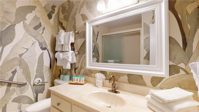 1175 N Beachview Dr Unit 389, Jekyll Island, GA 31527 - bathroom featuring an enclosed shower, toilet, and vanity