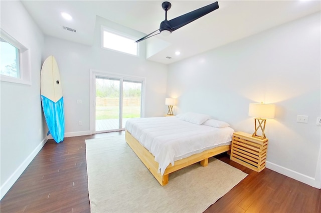 3935 Memorial Dr, Waycross, GA 31503 - bedroom featuring baseboards, wood finished floors, visible vents, and access to exterior
