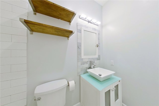 3935 Memorial Dr, Waycross, GA 31503 - bathroom with toilet and vanity