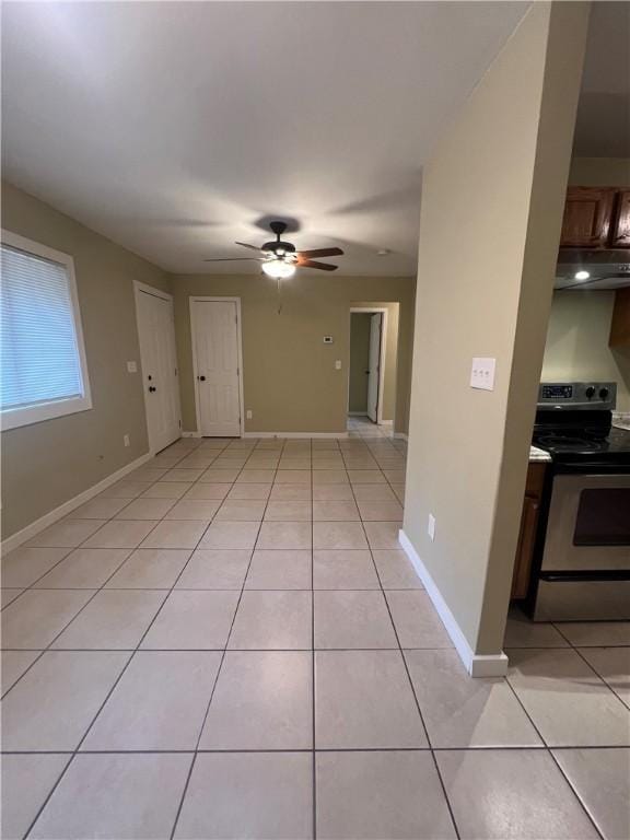 1920 Washington St, Brunswick, GA 31520 - unfurnished room featuring ceiling fan, light tile patterned flooring, and baseboards