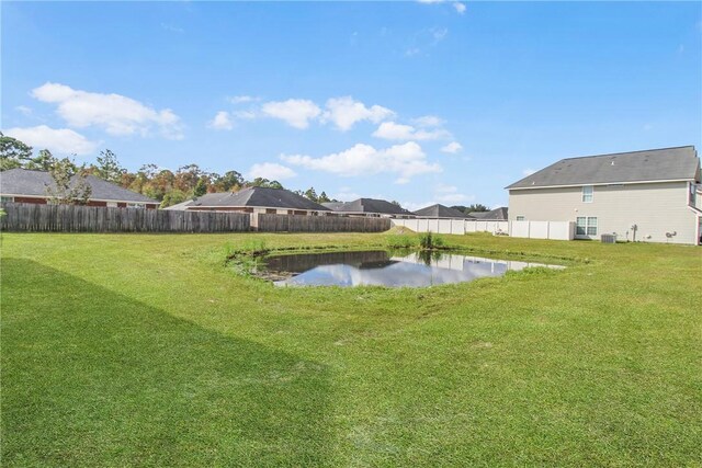 view of yard with a water view