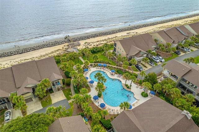 aerial view with a beach view and a water view