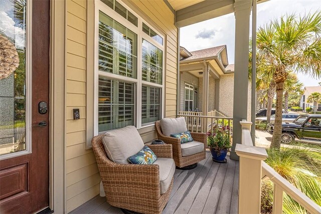 balcony featuring a porch