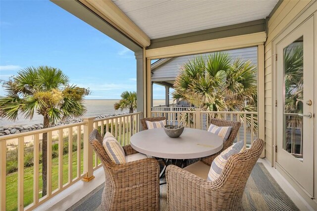 balcony featuring a water view