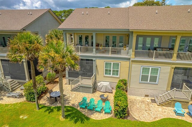 back of property featuring a patio