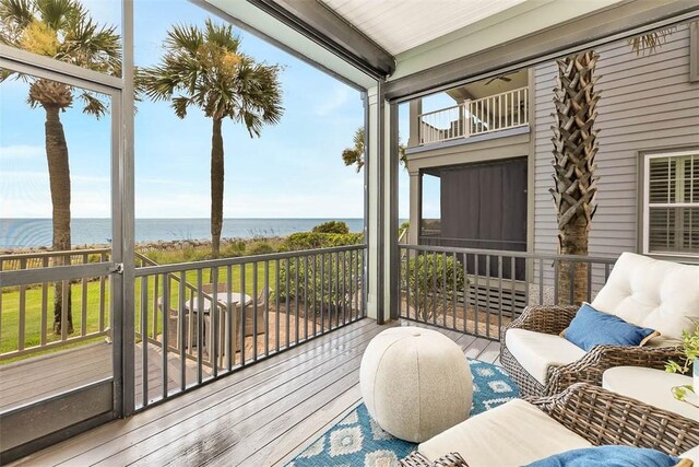 deck featuring a water view