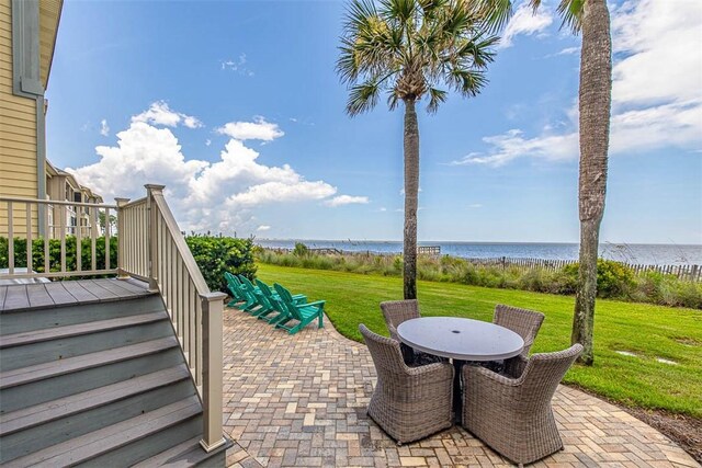 view of patio / terrace with a water view