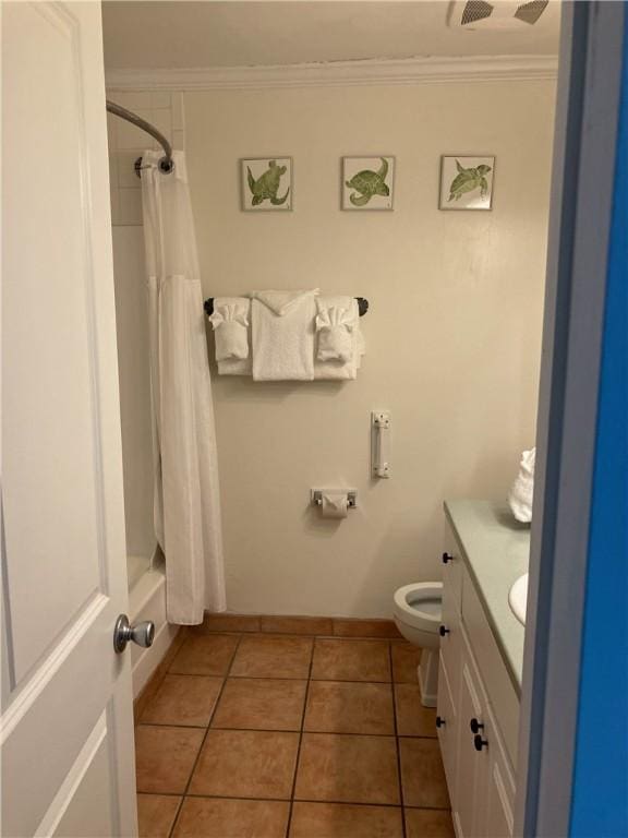 full bathroom with tile patterned floors, vanity, toilet, and crown molding