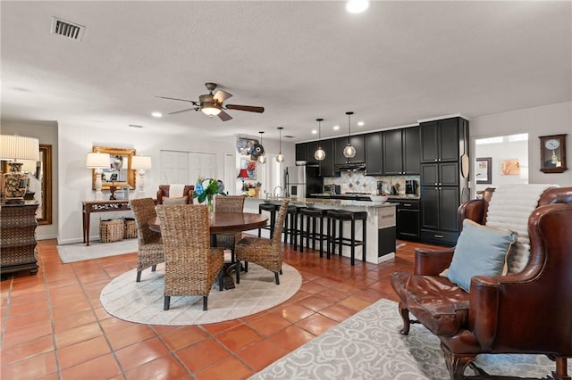 105 Driftwood Pl, Saint Simons Island, GA 31522 - dining space featuring light tile patterned floors, ceiling fan, and recessed lighting