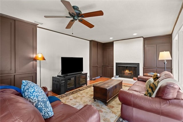 105 Driftwood Pl, Saint Simons Island, GA 31522 - living room featuring ceiling fan, recessed lighting, a large fireplace, and light wood finished floors