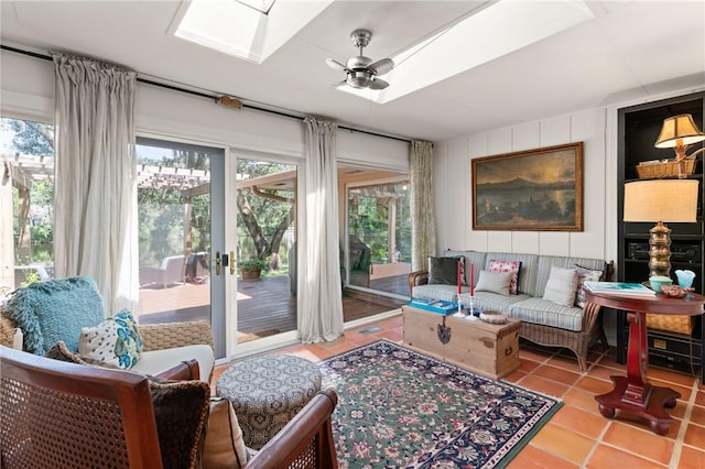105 Driftwood Pl, Saint Simons Island, GA 31522 - tiled living room with a skylight and a ceiling fan