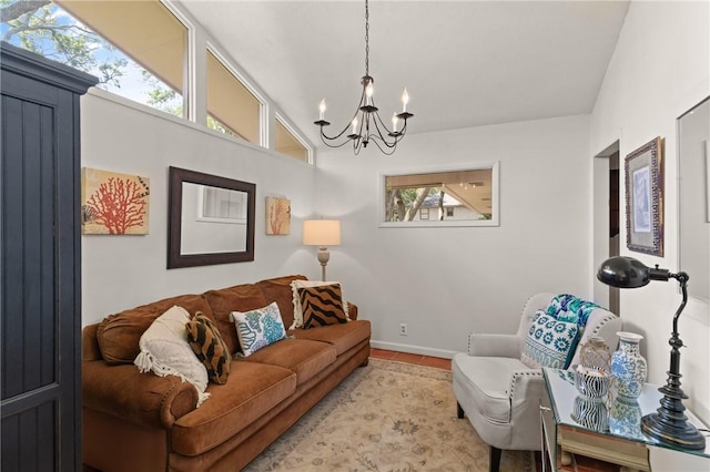 105 Driftwood Pl, Saint Simons Island, GA 31522 - living area with a chandelier, tile patterned flooring, and vaulted ceiling